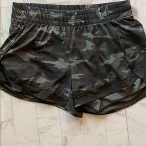 Camo Athleta size medium mesh racer 4” short